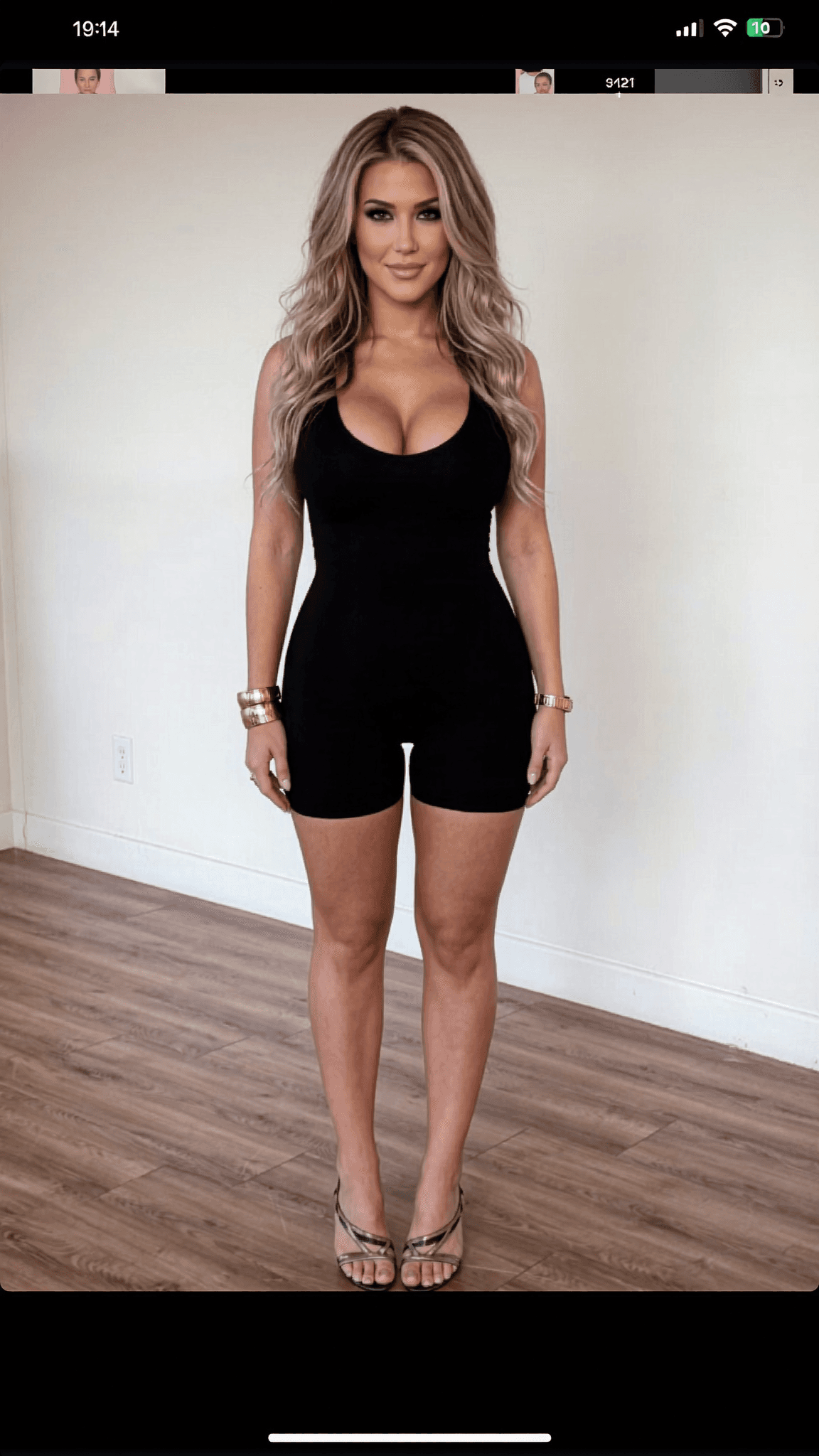 A woman in a dress stands outdoors, exuding confidence and allure.
