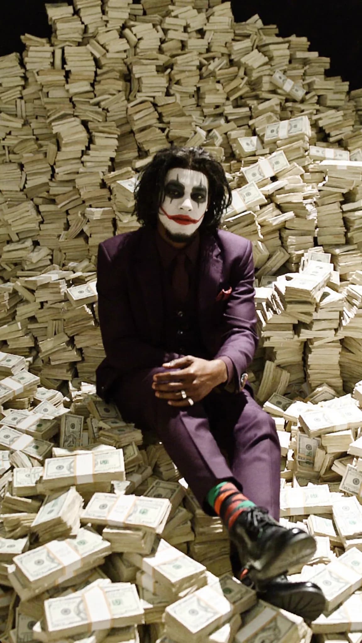 A person dressed in formal attire sits amidst a large pile of cash, with a playful and dominant demeanor.