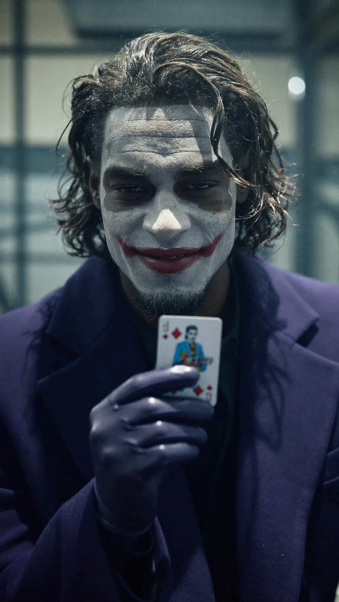 A character dressed as a clown holds up a playing card with an intense expression.