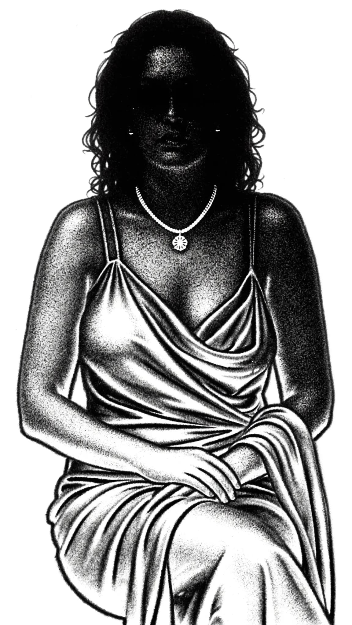 A woman in a dress sits with soft, romantic mood.