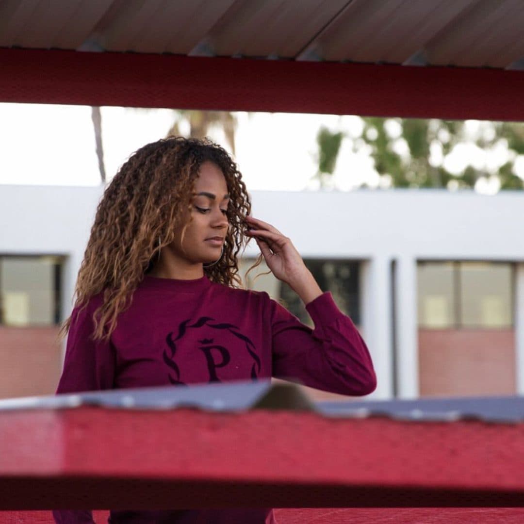 The maroon longsleeve — laurel-crest P on the chest.