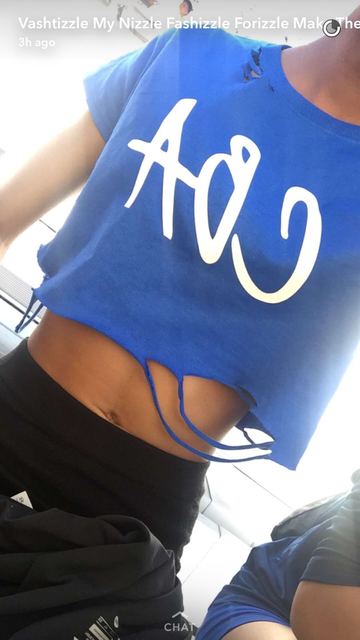 Unlabeled female subject — 'A' jersey + bikini photo